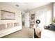 Bright and airy home office with a comfortable sofa and work desk at 1407 7Th N Ave, St Petersburg, FL 33705