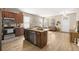 Open kitchen with island, stainless steel appliances, and granite countertops at 1407 7Th N Ave, St Petersburg, FL 33705