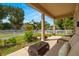 Relaxing front porch with wicker furniture, overlooking the yard at 1407 7Th N Ave, St Petersburg, FL 33705