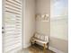 Inviting entryway with a bench, providing a convenient space to sit and remove shoes at 1407 7Th N Ave, St Petersburg, FL 33705