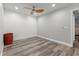 Spacious bedroom with wood-look floors and ceiling fan at 214 Cape Harbour Loop # 105, Bradenton, FL 34212