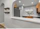 Open kitchen with breakfast bar and stainless steel appliances at 214 Cape Harbour Loop # 105, Bradenton, FL 34212