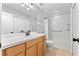 Clean bathroom with updated vanity, tub, and shower at 214 Cape Harbour Loop # 105, Bradenton, FL 34212