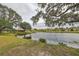 Serene pond view from the backyard at 2203 W Del Webb Blvd, Sun City Center, FL 33573