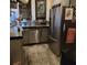 Modern kitchen with stainless steel appliances and granite countertops at 2255 Trelain S Dr, St Petersburg, FL 33712