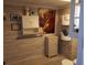 Bathroom with wood-look floor and decorative art at 2255 Trelain S Dr, St Petersburg, FL 33712