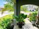 Inviting front porch with lush landscaping at 31559 Barrel Wave Way, Wesley Chapel, FL 33545