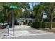 Street view of a single-story house with a teal roof and well-manicured lawn at 785 5Th S St, Safety Harbor, FL 34695