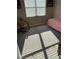 Bedroom with rocking chair and bed at 16015 Cape Coral Dr, Wimauma, FL 33598