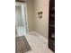 Hallway with views of the Laundry Room at 16015 Cape Coral Dr, Wimauma, FL 33598