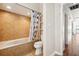 Bathroom area with a tub/shower and a toilet at 3127 W Sligh Ave # 204B, Tampa, FL 33614