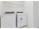 Laundry room equipped with new washer and dryer for convenience at 6220 Golden Beach Dr, Apollo Beach, FL 33572