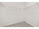 Well-organized walk-in closet with wire shelving for maximized storage and convenience at 6240 Golden Beach Dr, Apollo Beach, FL 33572