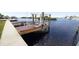 Private boat lift on a wooden dock at 6413 Harbor Dr, Hudson, FL 34667