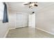 Bright bedroom with ceiling fan and built-in closet at 1756 Ashton Abbey Rd, Clearwater, FL 33755