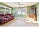Relaxing living area with green walls and wood flooring at 1756 Ashton Abbey Rd, Clearwater, FL 33755