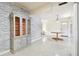 Dining area with built-in hutch and terrazzo floor at 1756 Ashton Abbey Rd, Clearwater, FL 33755