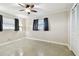 Simple bedroom with terrazzo floor and ample closet space at 1756 Ashton Abbey Rd, Clearwater, FL 33755