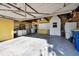 Spacious garage with storage cabinets and room for multiple vehicles at 1756 Ashton Abbey Rd, Clearwater, FL 33755