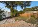 Landscaped backyard with stone pathway and wooden fence at 1756 Ashton Abbey Rd, Clearwater, FL 33755