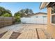 Relaxing brick patio with table and chairs, ideal for outdoor dining at 1756 Ashton Abbey Rd, Clearwater, FL 33755