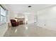 Living room with fireplace and terrazzo flooring at 1756 Ashton Abbey Rd, Clearwater, FL 33755