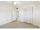 Well-lit bedroom with ceiling fan and closet at 1756 Ashton Abbey Rd, Clearwater, FL 33755