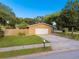 1-story home with attached garage and fenced yard at 1756 Ashton Abbey Rd, Clearwater, FL 33755