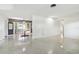 Open dining area with built-in hutch and terrazzo floor at 1756 Ashton Abbey Rd, Clearwater, FL 33755