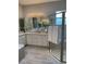 Spa-like bathroom with shower, vanity and tiled floor at 16015 Cape Coral Dr, Wimauma, FL 33598