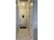 Bright entryway with tile flooring and coat closet at 16015 Cape Coral Dr, Wimauma, FL 33598