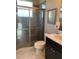 Bathroom with shower, toilet and vanity at 16015 Cape Coral Dr, Wimauma, FL 33598