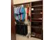 Well-organized closet with shelving and hanging rods at 16015 Cape Coral Dr, Wimauma, FL 33598