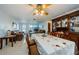 Bright dining room with wood table and chairs at 1551 Derrick St, Holiday, FL 34690