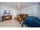 Cozy bedroom with brown leather couch and window blinds at 1551 Derrick St, Holiday, FL 34690