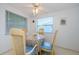 Bright dining area with table and four chairs, perfect for Gathering meals at 1551 Derrick St, Holiday, FL 34690