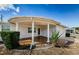 Covered porch with terracotta tile flooring at 1551 Derrick St, Holiday, FL 34690