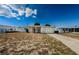 Single story home with attached garage and driveway at 1551 Derrick St, Holiday, FL 34690