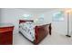 Bedroom with a double bed and floral bedding at 1551 Derrick St, Holiday, FL 34690