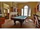 Community room with a pool table, workspaces and comfortable seating at 2757 Via Cipriani # 1132A, Clearwater, FL 33764
