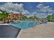 Relaxing resort-style pool with plenty of lounge chairs and umbrellas at 2757 Via Cipriani # 1132A, Clearwater, FL 33764