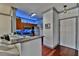 Modern kitchen features granite countertops, stainless steel appliances, and a breakfast bar at 2757 Via Cipriani # 1132A, Clearwater, FL 33764