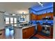 Modern kitchen with granite countertops and stainless steel appliances at 2757 Via Cipriani # 1132A, Clearwater, FL 33764