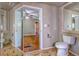 Bathroom featuring a toilet and tiled floors at 120 Palmetto Ln, Largo, FL 33770