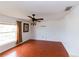 Living Room with wood floors and large window at 2746 Heathgate Way, Land O Lakes, FL 34638