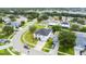 Two-story house located in a neighborhood with a lake nearby at 2746 Heathgate Way, Land O Lakes, FL 34638