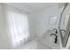 Bathroom with double vanity and marble flooring at 2746 Heathgate Way, Land O Lakes, FL 34638