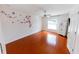Bedroom featuring wood floors and decorative wall art at 2746 Heathgate Way, Land O Lakes, FL 34638