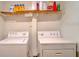 Laundry room with washer and dryer included at 9205 Tudor Dr # C209, Tampa, FL 33615