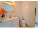 Clean bathroom with white vanity and tiled floor at 9205 Tudor Dr # C209, Tampa, FL 33615